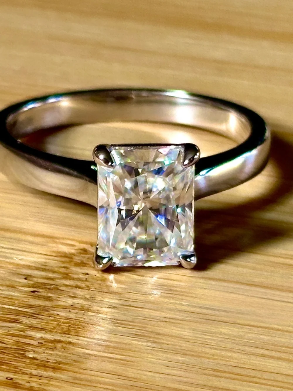 A certified 3ct radiant Moissanite solitaire in solid sterling silver and 18k!